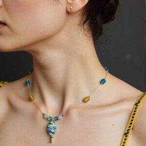 Spring and sunshine. Yellow/Turquoise/Crystal floating necklace. Multi color gla